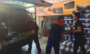 El segundo día de las actividades de ayuda humanitaria de los comerciantes chinos en las terribles inundaciones más graves de la historia de Chile.