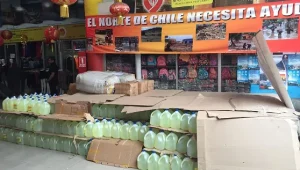 El segundo día de las actividades de ayuda humanitaria de los comerciantes chinos en las terribles inundaciones más graves de la historia de Chile.