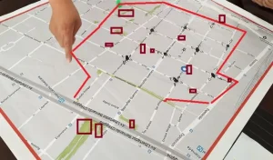 Coordinación de Asociaciones Chinas: Plan General para Solucionar Problemas de Seguridad en la Zona Mayorista de Santiago